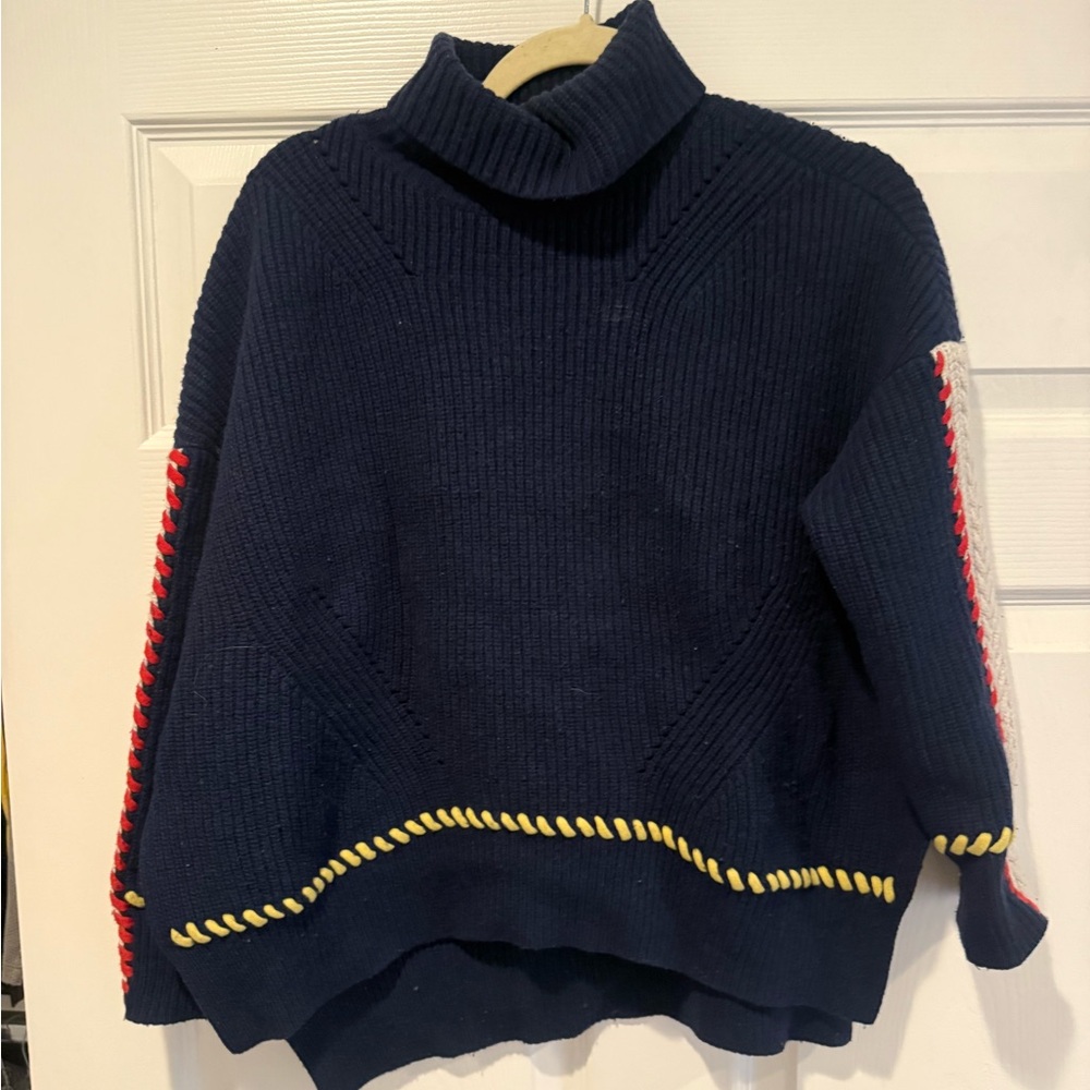 SJYP Blue Turtleneck Sweater with Yellow and Red Accents
